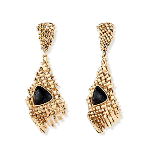 Gold-toned geometric mesh earrings with black triangular resin stones and fringe detail on neutral background