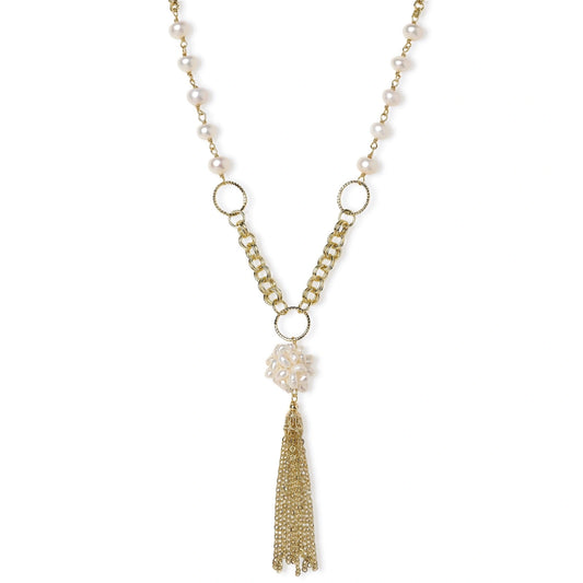 Long gold-plated necklace with freshwater pearls, chunky chain links, and flowing tassel pendant