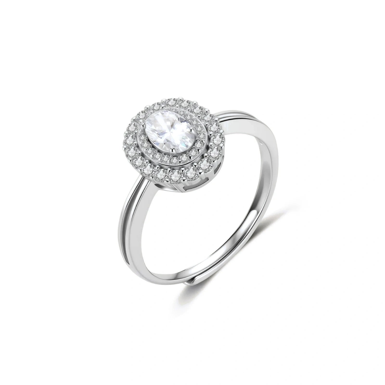 Sterling silver ring with oval moissanite center stone surrounded by double halo of sparkling stones on neutral background.