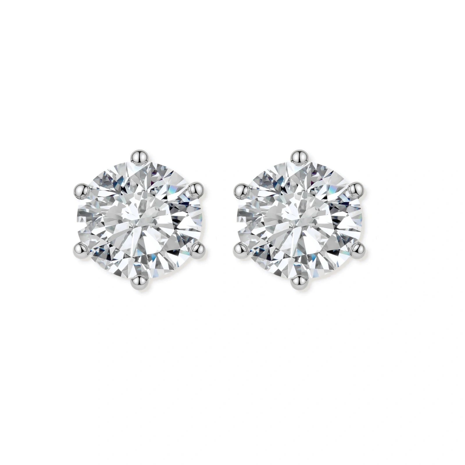 Close-up of round brilliant-cut moissanite stud earrings in 6-prong sterling silver settings showing exceptional sparkle