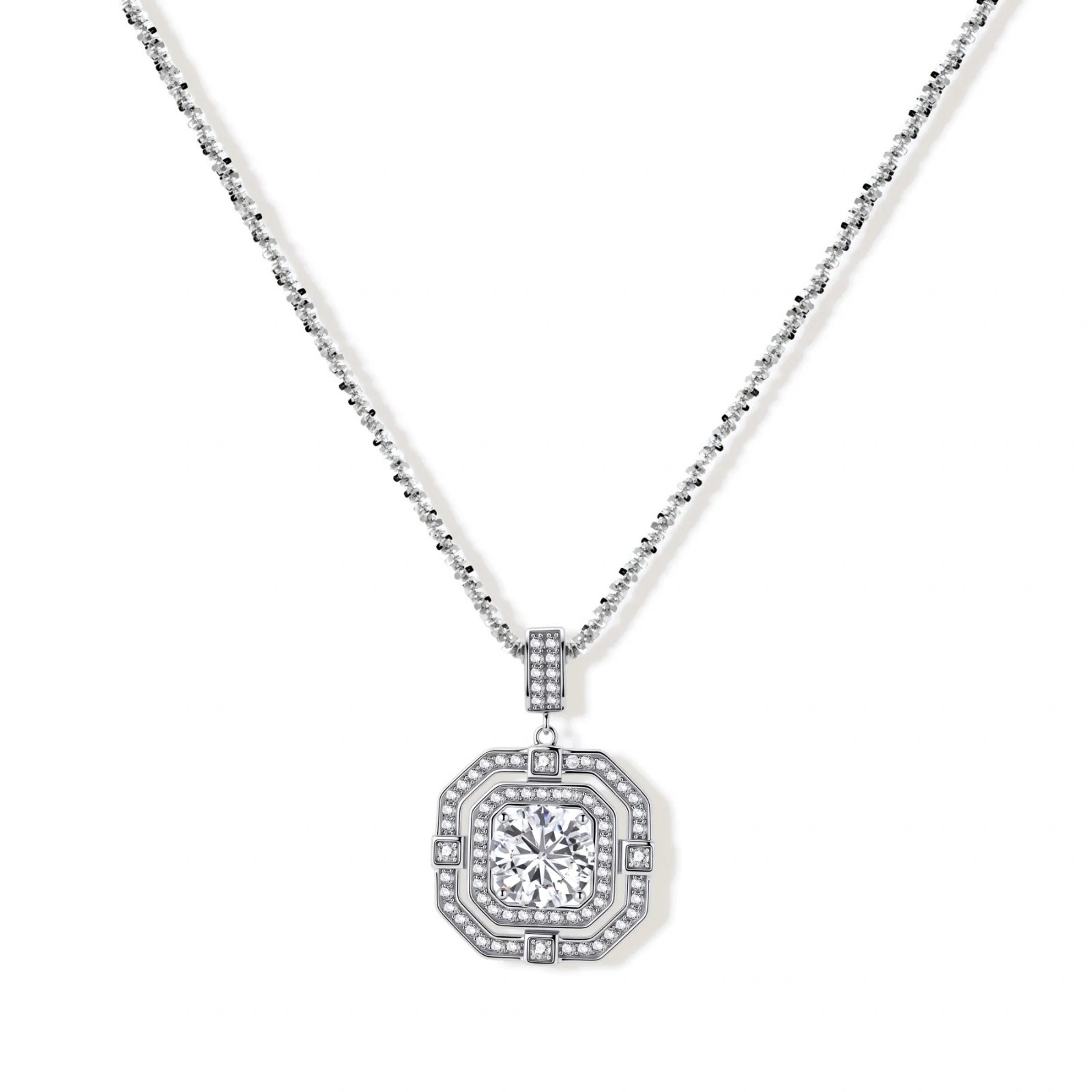 Sterling silver octagonal pendant necklace with brilliant moissanite center stone and halo setting on white background.