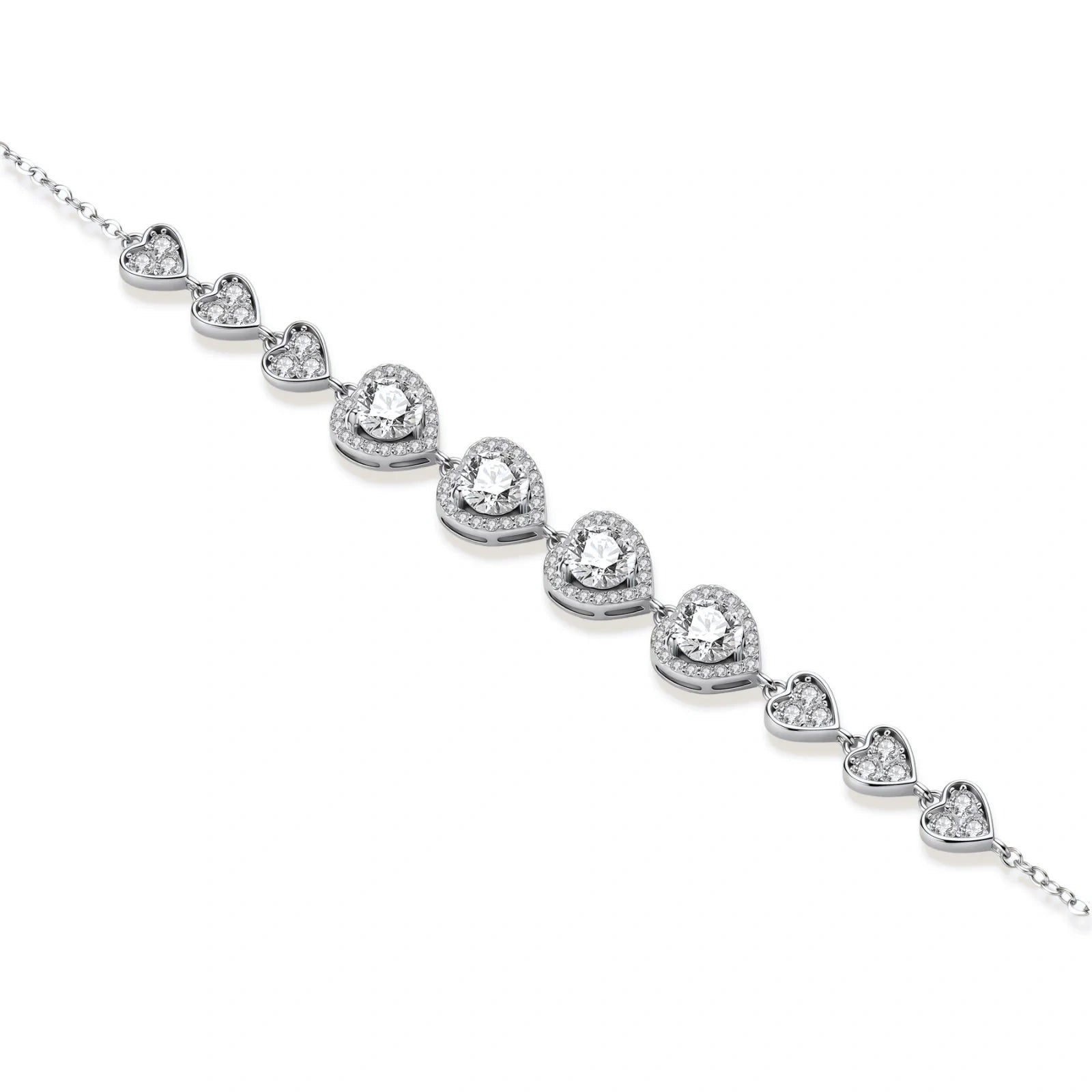 Sterling silver bracelet with graduated heart-shaped links and sparkling moissanite stones in VVS1 clarity on white background.