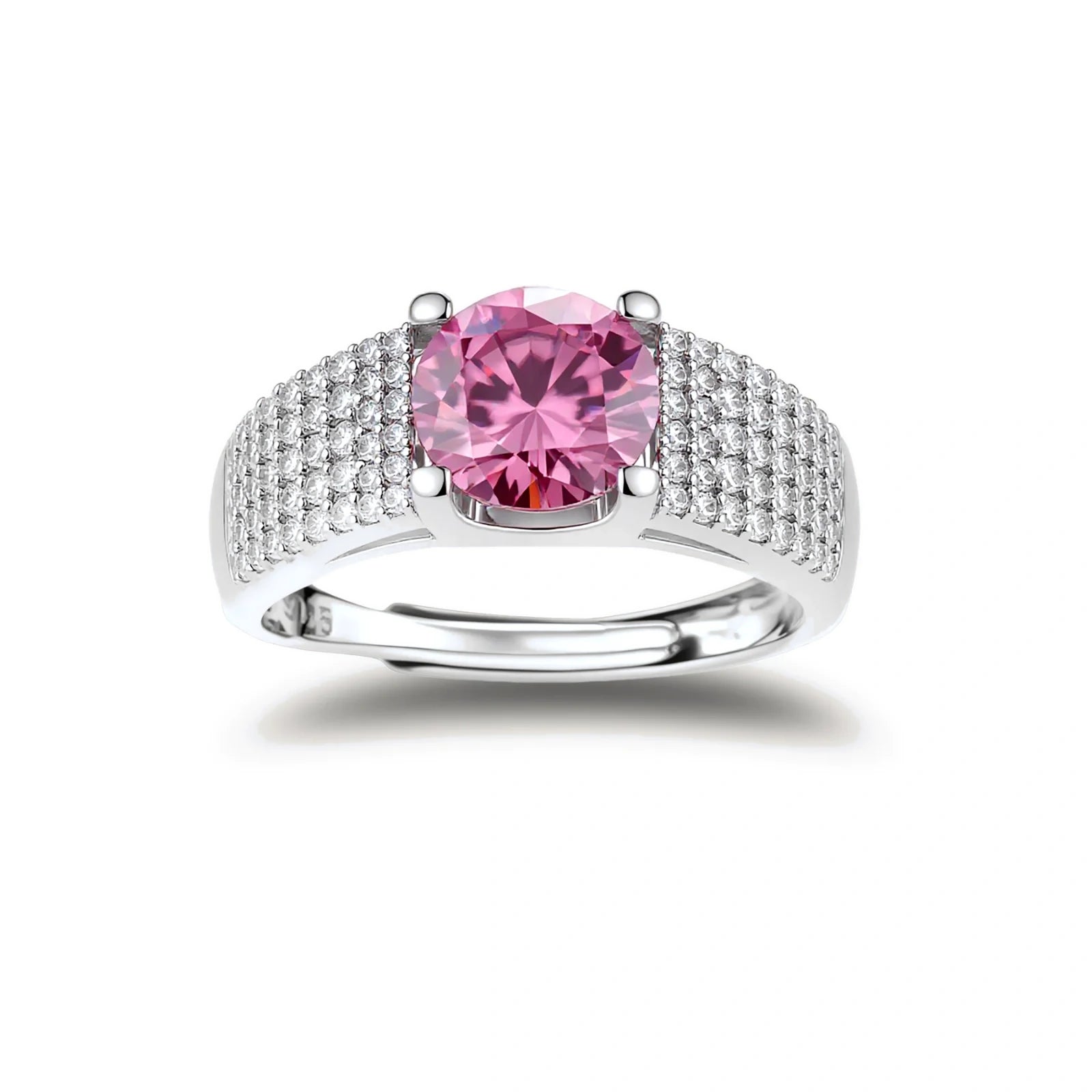 Sterling silver jewelry set featuring pink moissanite stones in halo settings on white background.