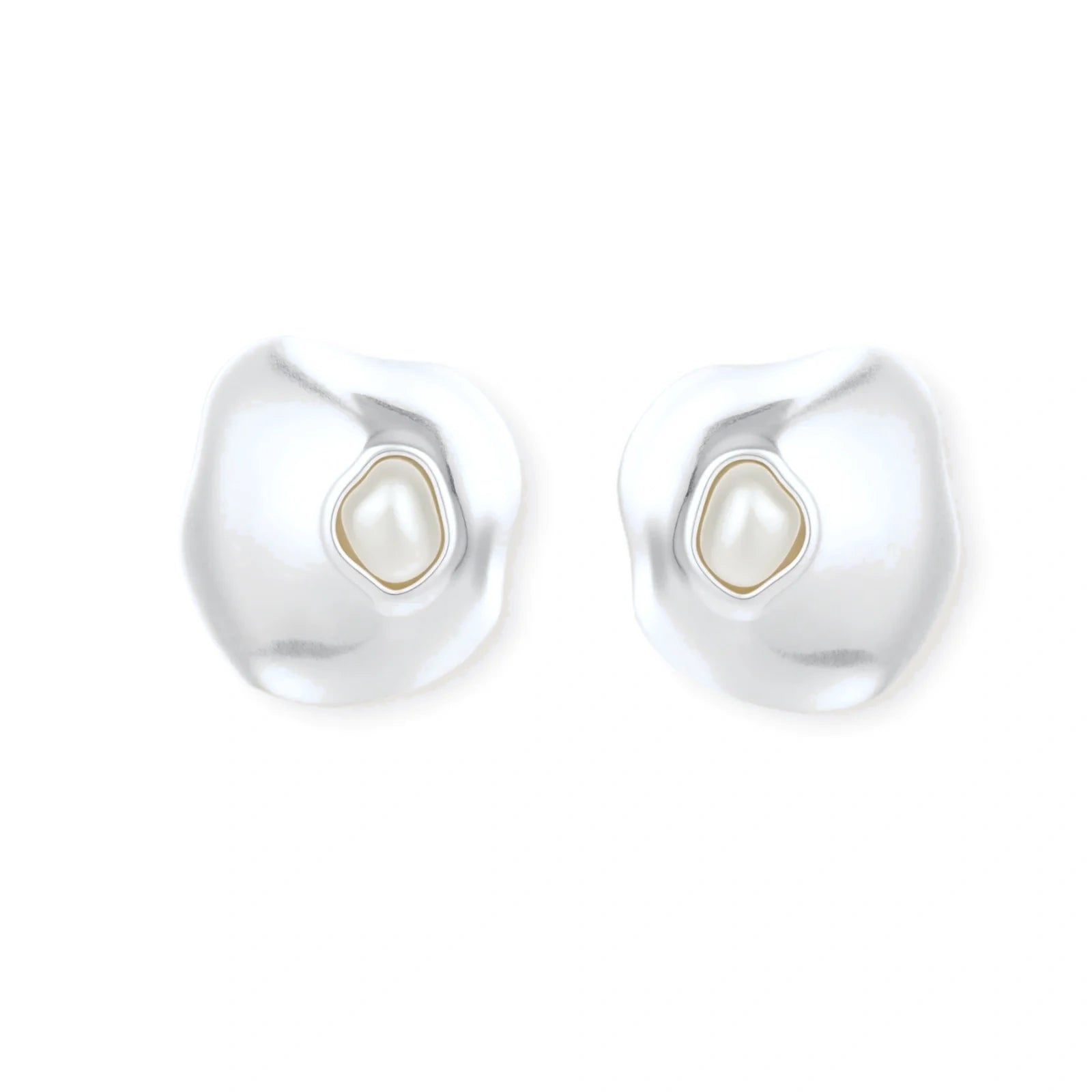 Organic-shaped eco-zinc alloy stud earrings with resin pearl centers and sterling silver posts on white background.