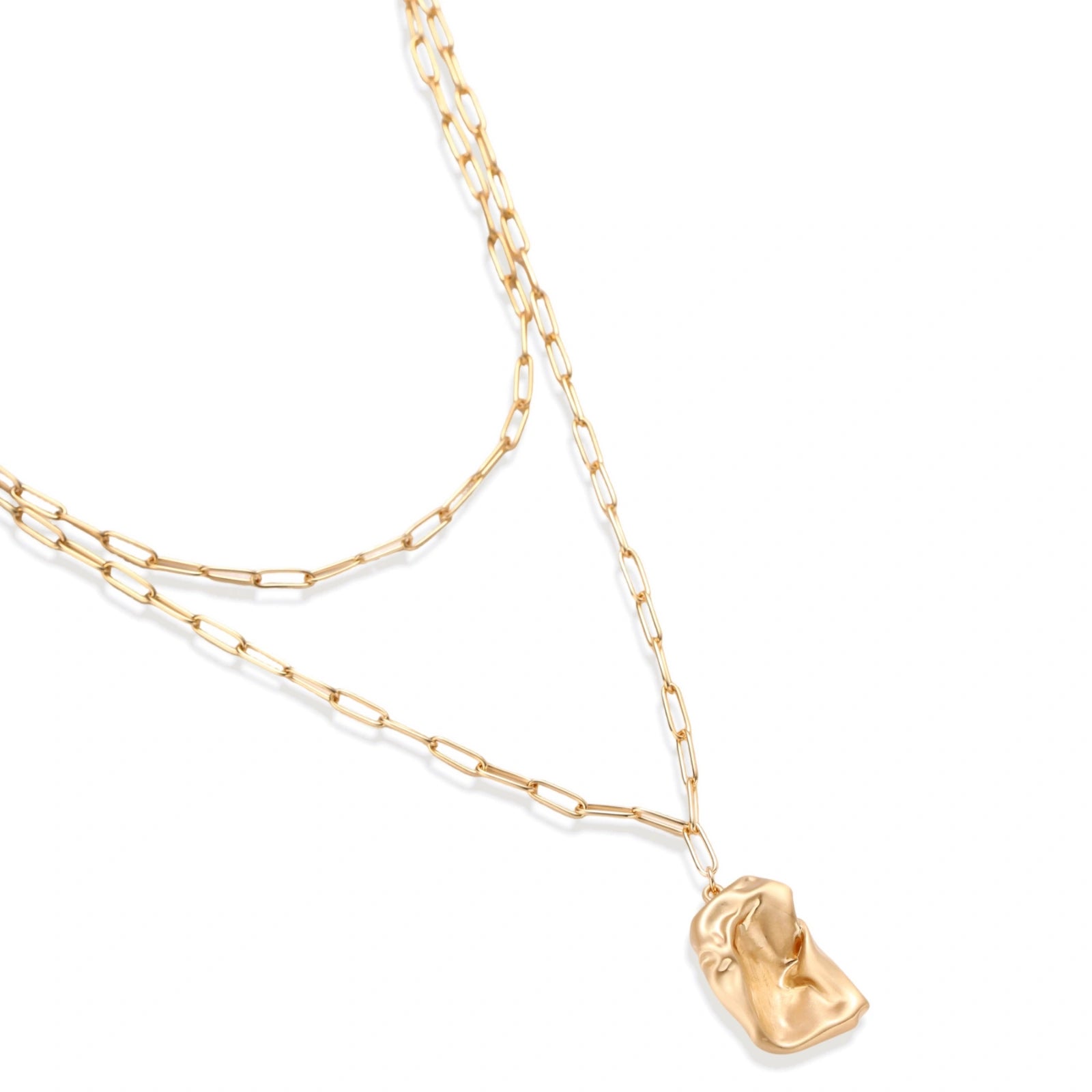 Layered paperclip chain necklace with organic flowing pendant made from eco-zinc alloy in warm gold finish