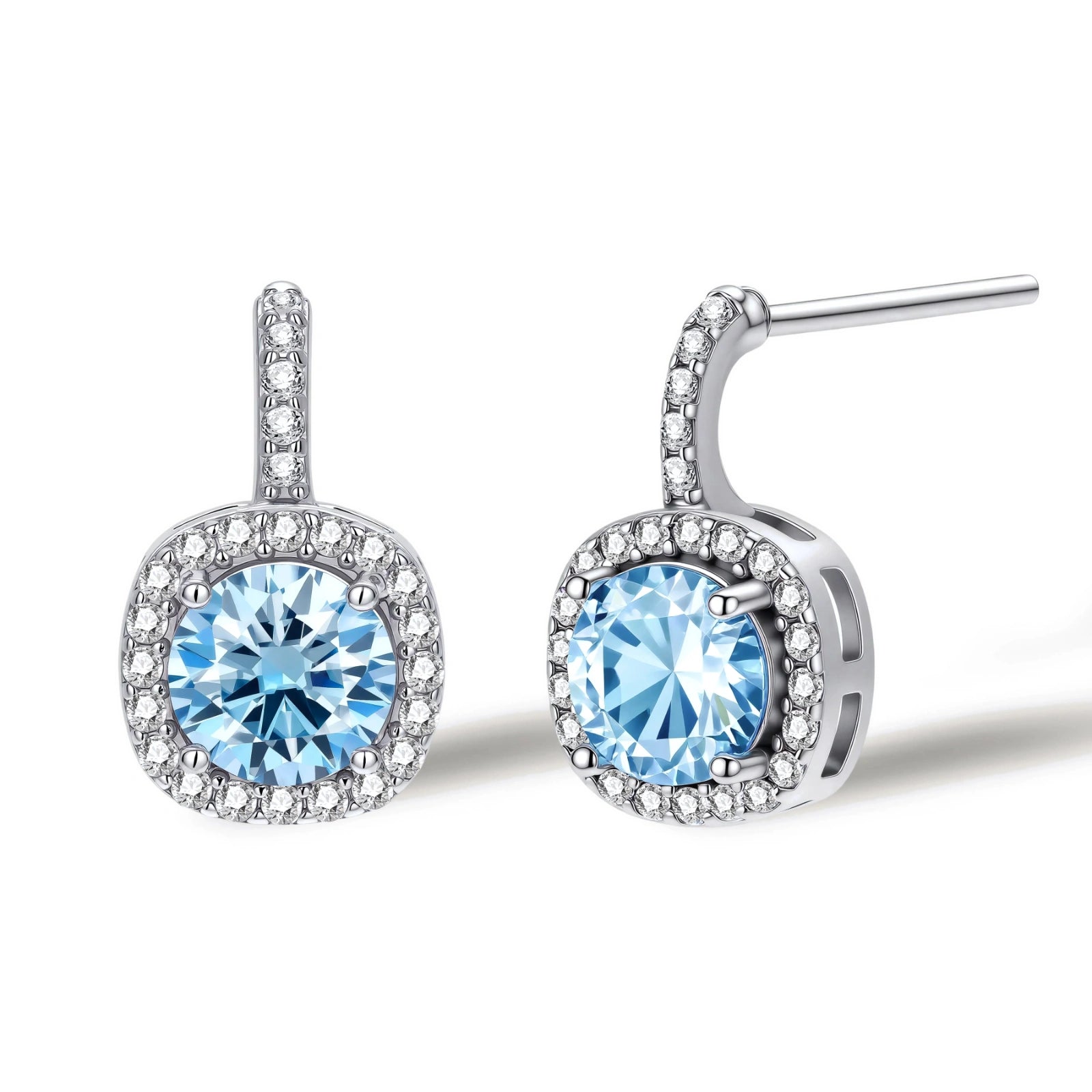 Sterling silver drop earrings featuring cushion-cut blue moissanite stones surrounded by sparkling halo settings