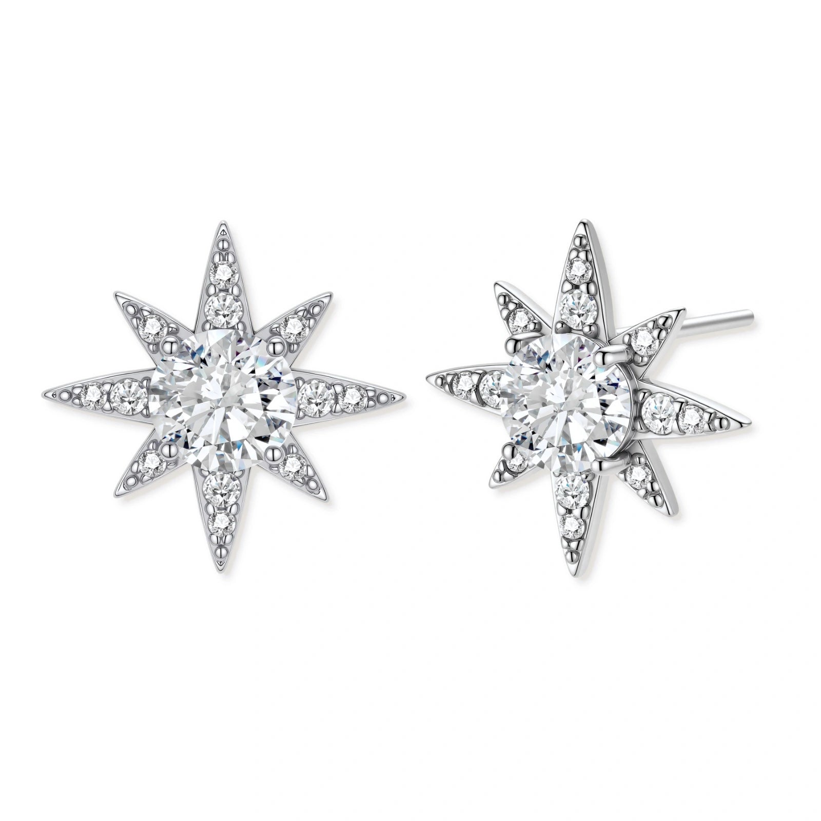Sterling silver star-shaped stud earrings with brilliant moissanite center stones and pavé details on neutral background.