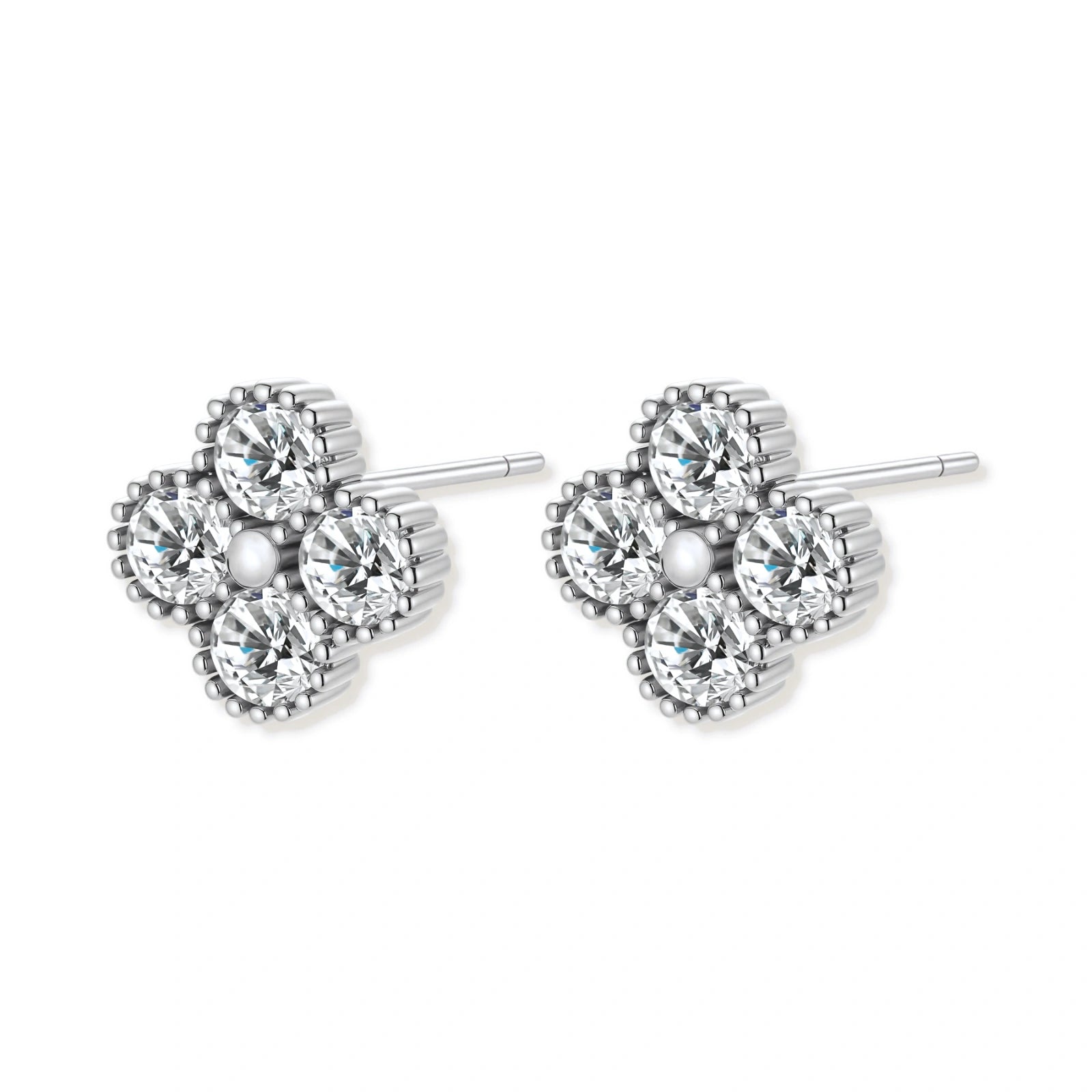 Dainty sterling silver quatrefoil stud earrings with four brilliant moissanite stones and center accent on white background.