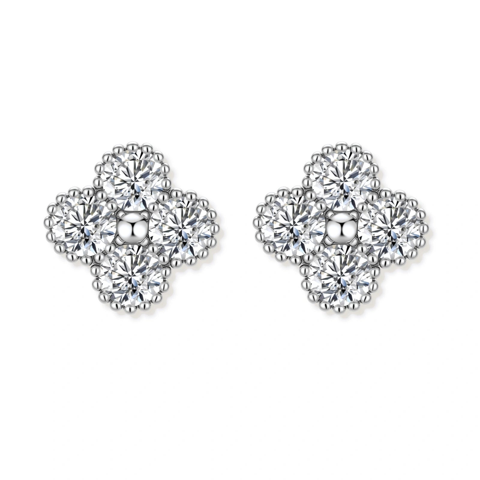 Dainty sterling silver quatrefoil stud earrings with four brilliant moissanite stones and center accent on white background.