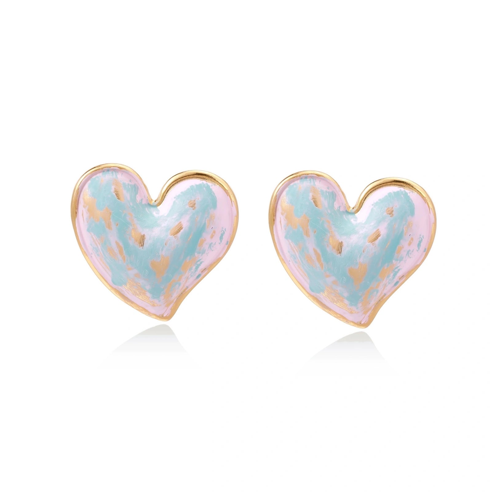 Heart-shaped stud earrings with swirled turquoise and pink enamel in gold-plated frames on cream background