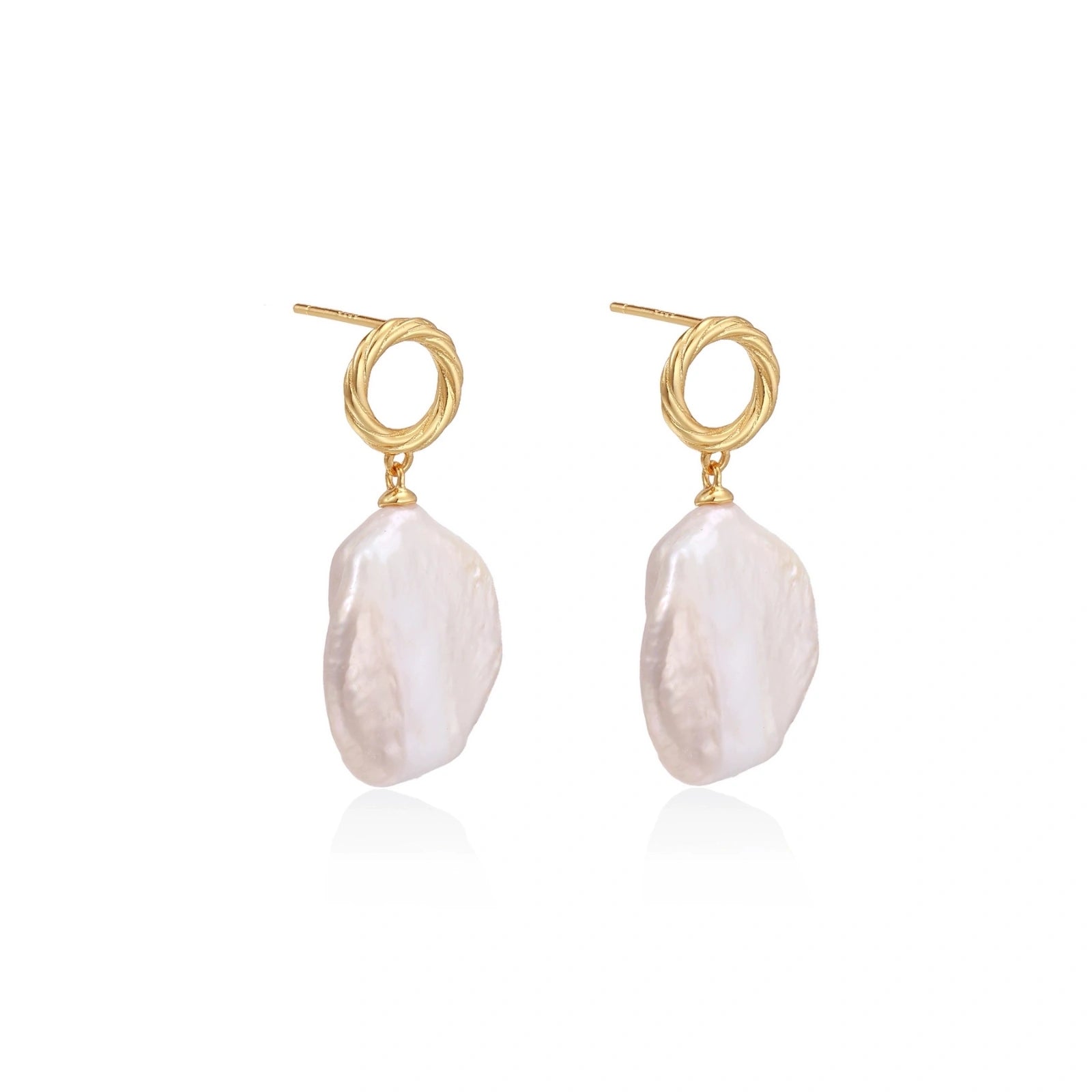 18K gold vermeil twisted circle studs with organic white baroque pearl drops on cream background