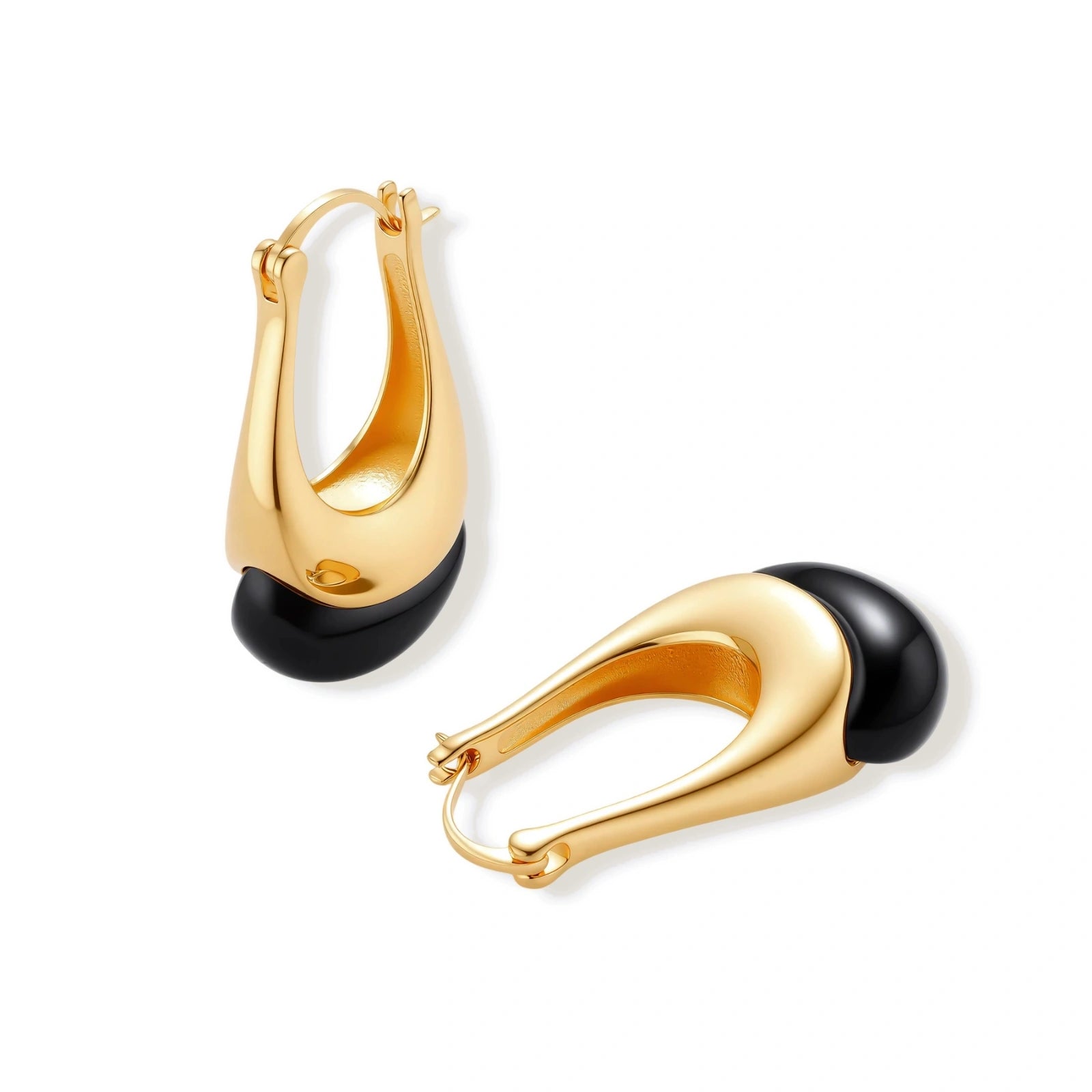 Gold-plated drop earrings featuring black agate stones with hoop closure on white background, showing elegant teardrop design.