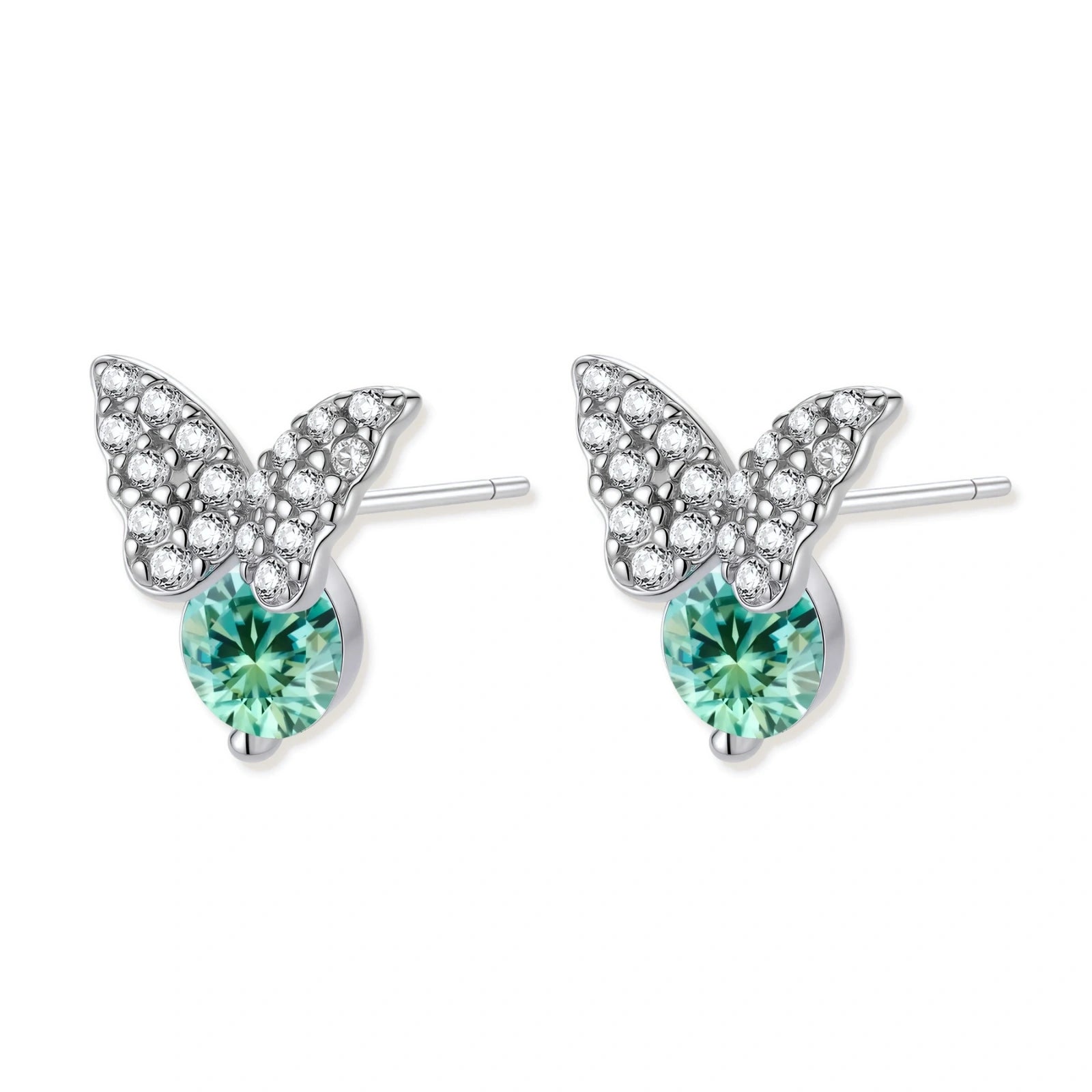 Sterling silver butterfly stud earrings with crystal wings and mint green center stones on cream background.
