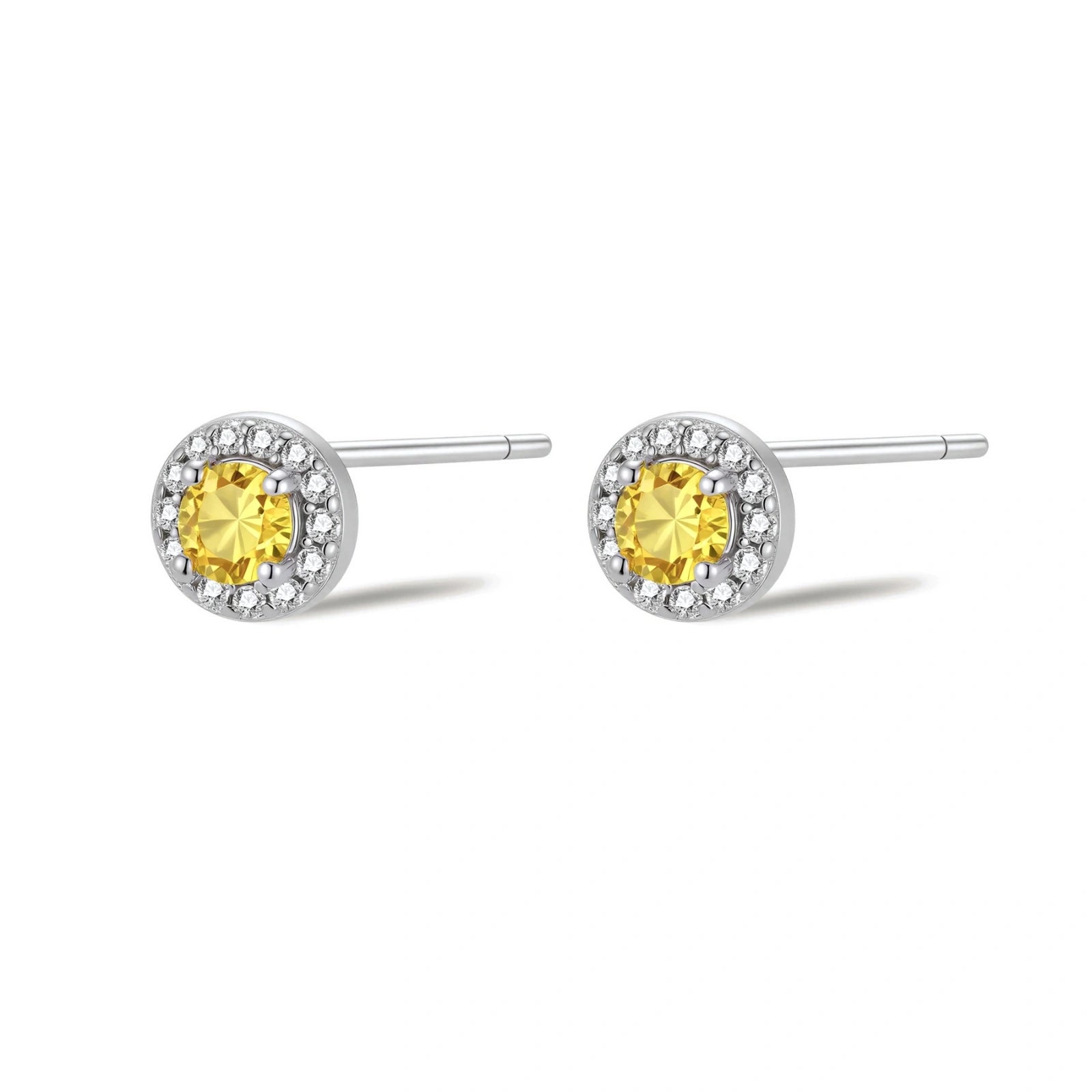 Dainty sterling silver stud earrings with yellow moissanite center stones surrounded by white halo stones