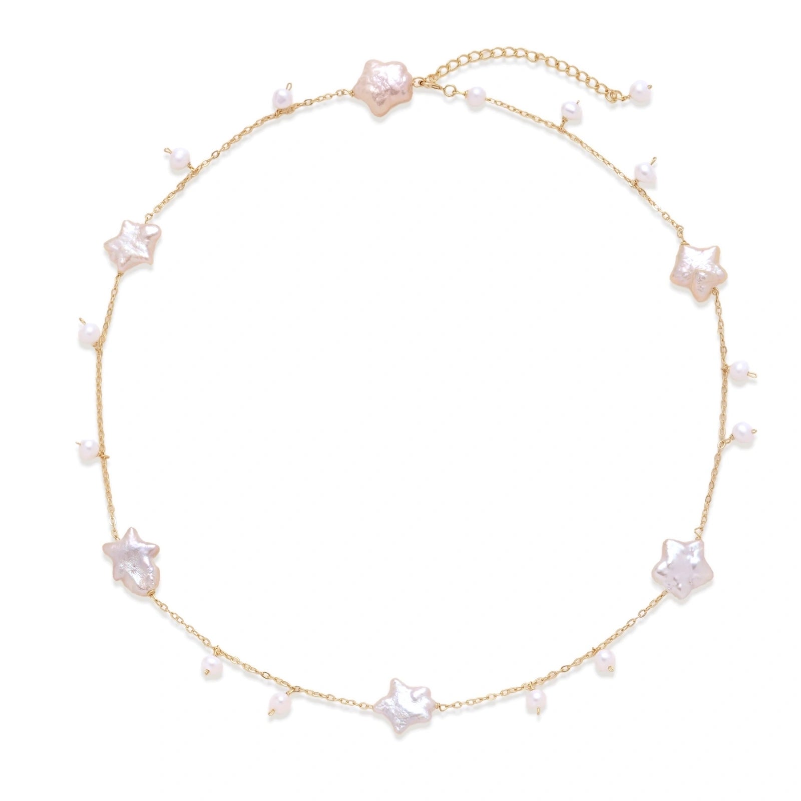Gold vermeil chain with iridescent star-shaped baroque pearls and small round freshwater pearl drops on cream background.