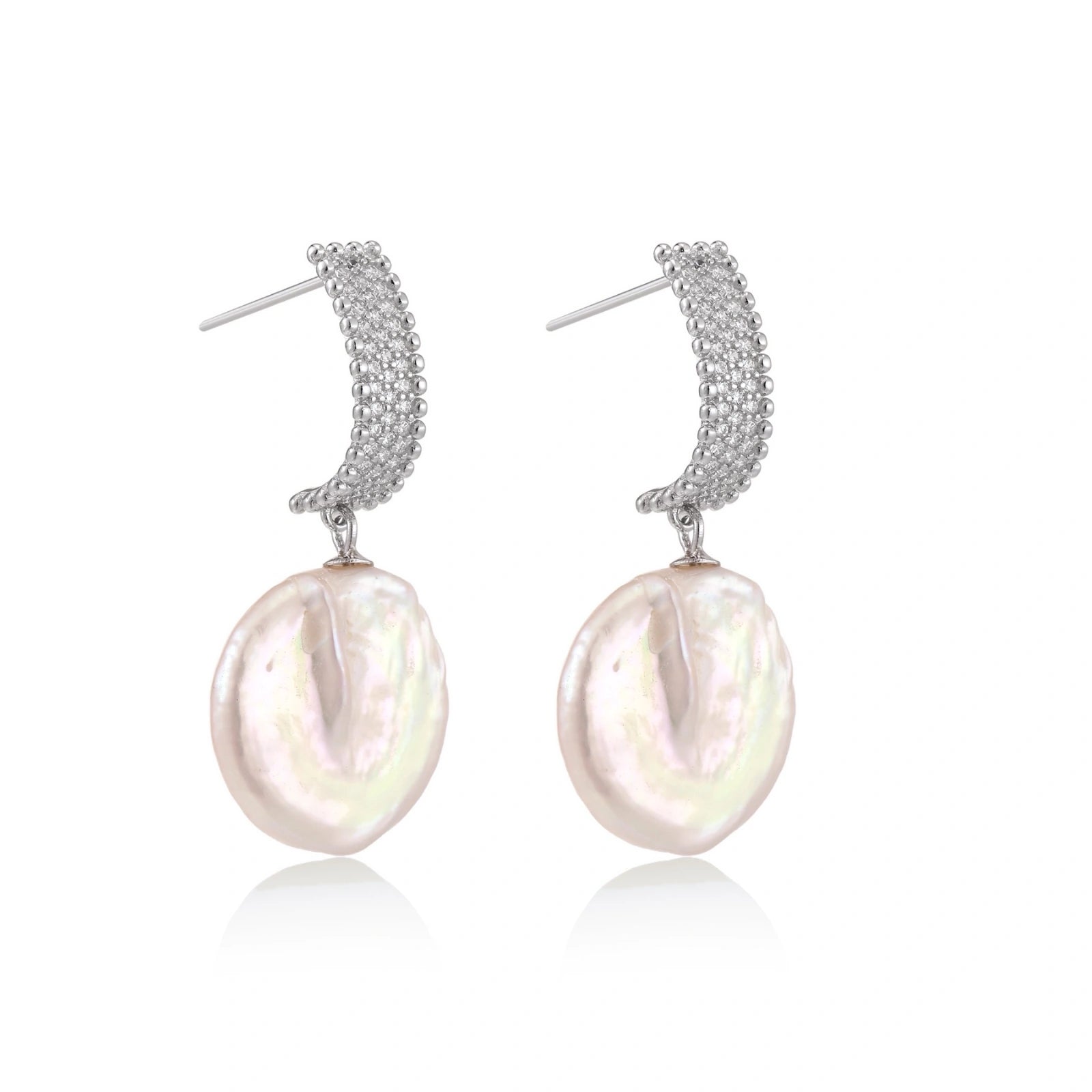 Rhodium-plated silver curved stud with pave stones and baroque pearl drop on white background
