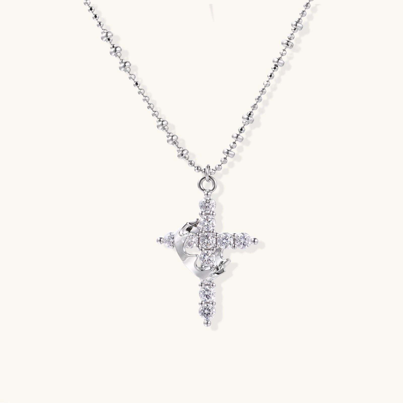 White gold-plated  pendant adorned with sparkling zirconia stones and crescent moon accent on ball chain