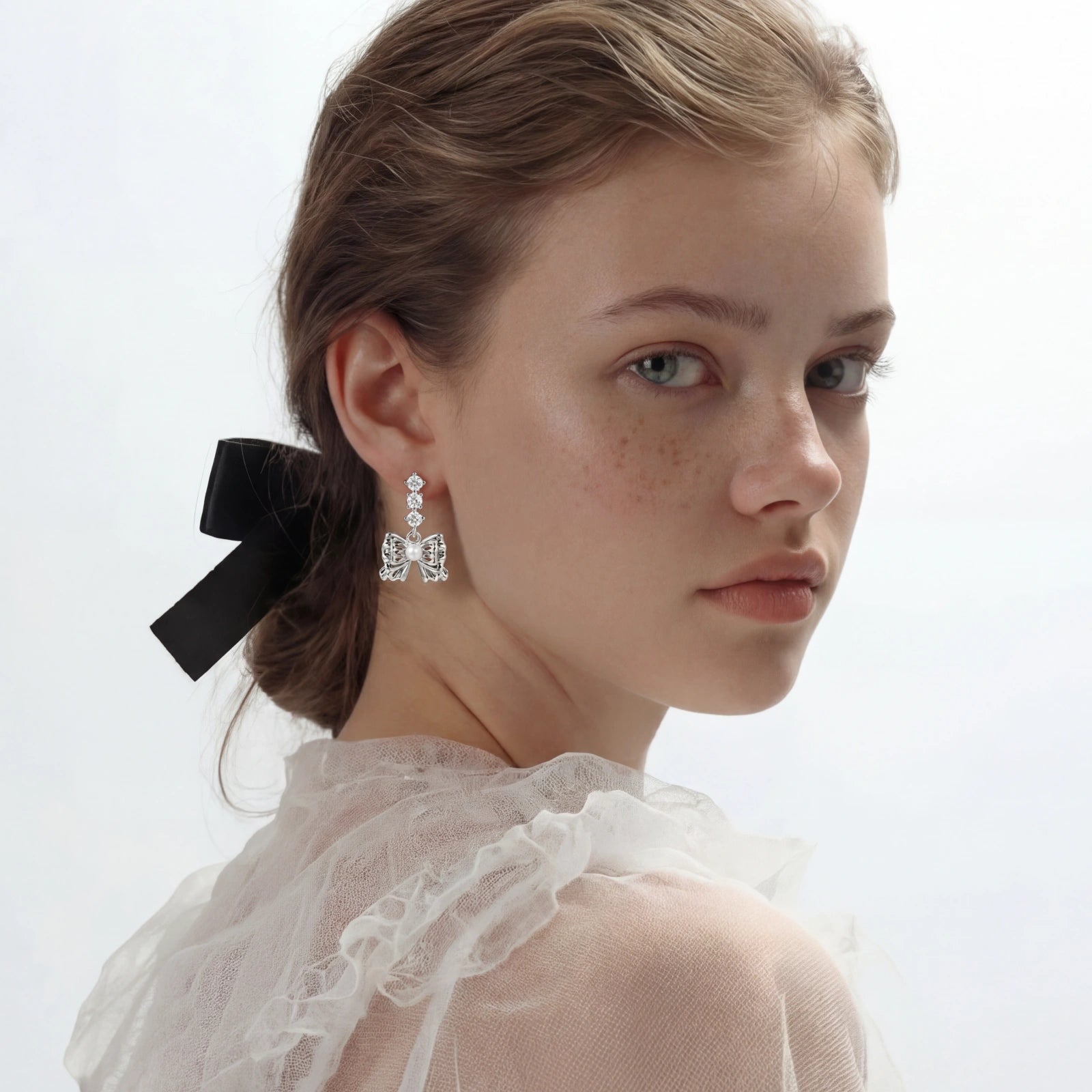 Pearl Bow Drop Earrings by AlbaLuxe
