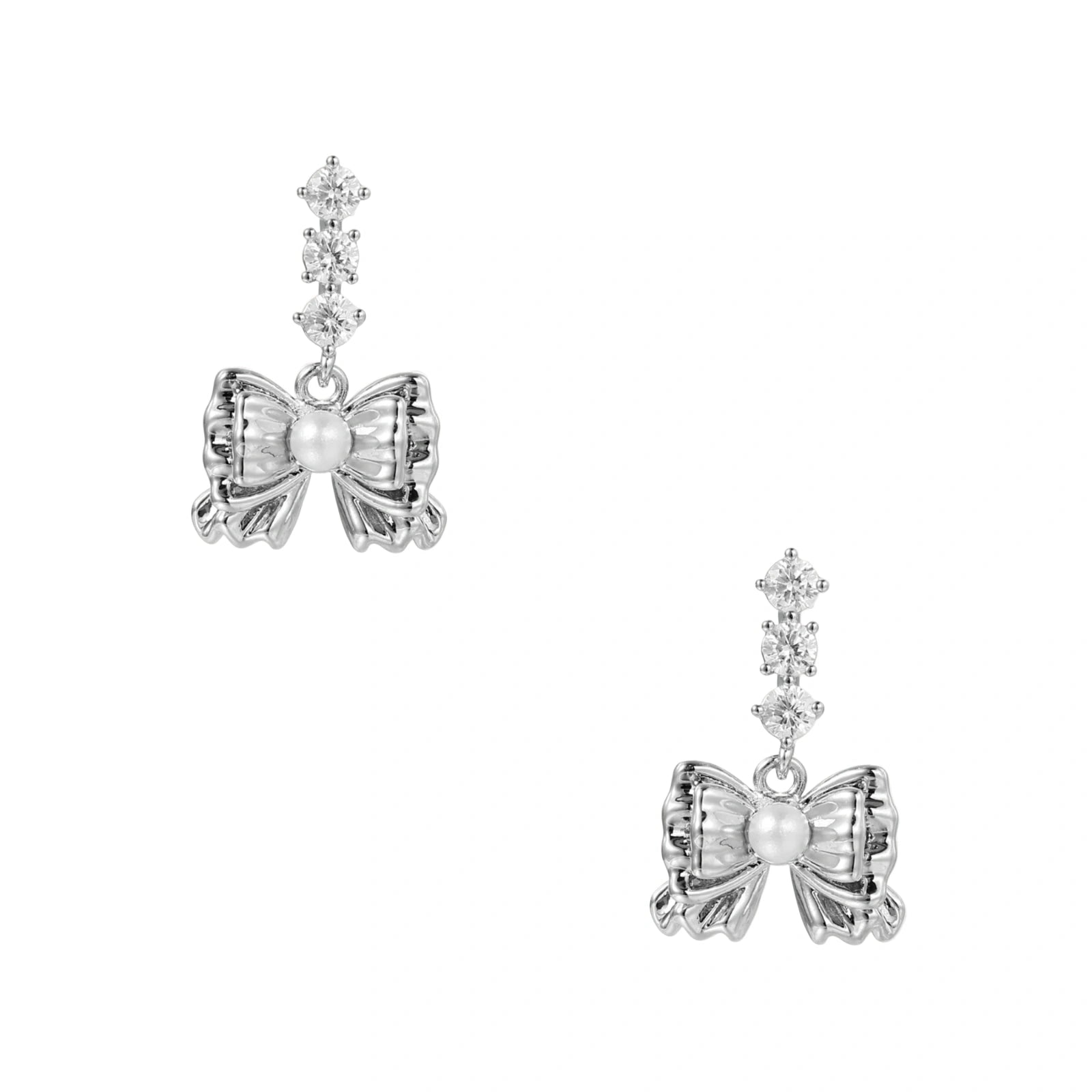White gold plated drop earrings with three graduated zirconia crystals leading to a bow charm with pearl center
