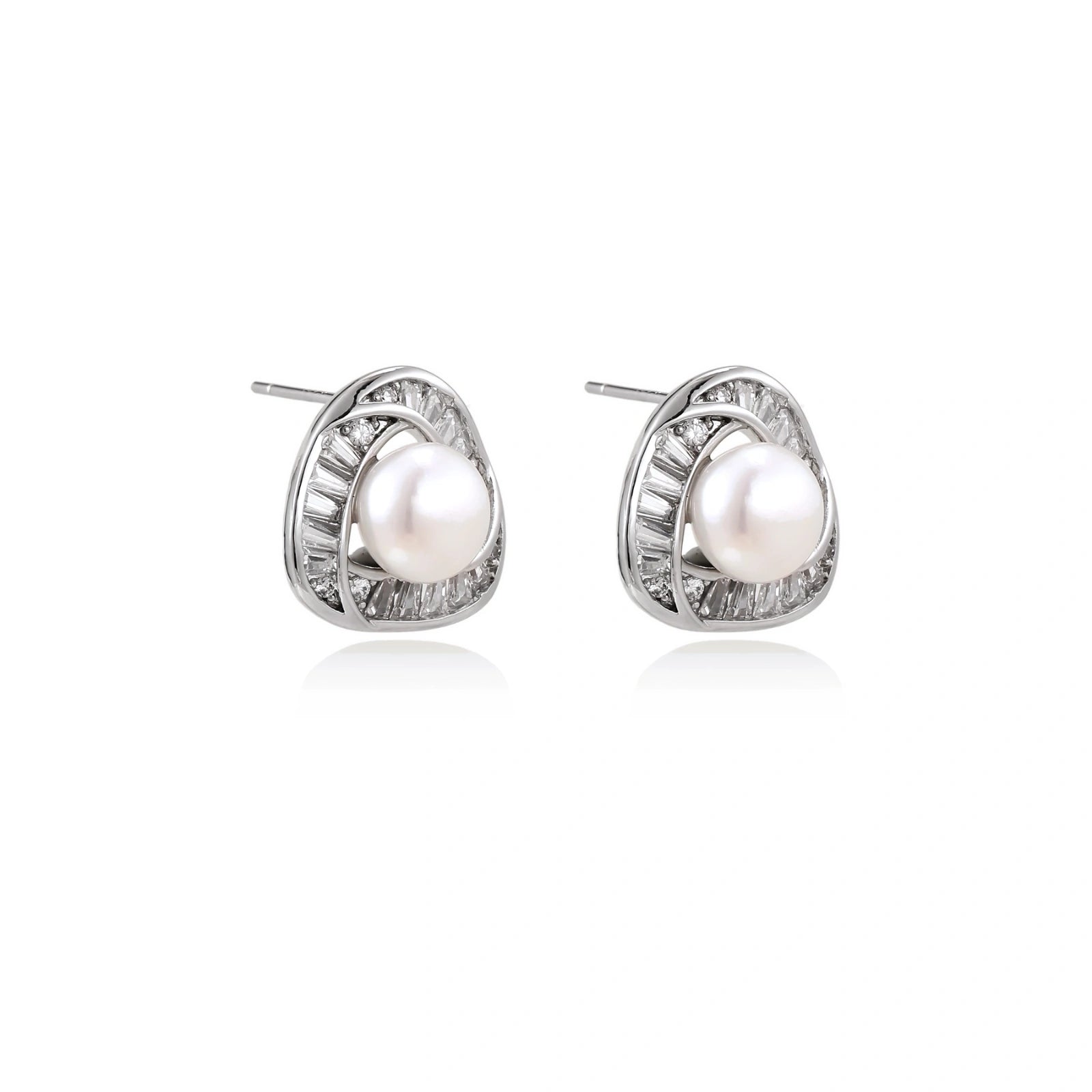 Triangular white gold plated stud earrings with central freshwater pearl and baguette-cut stones on white background