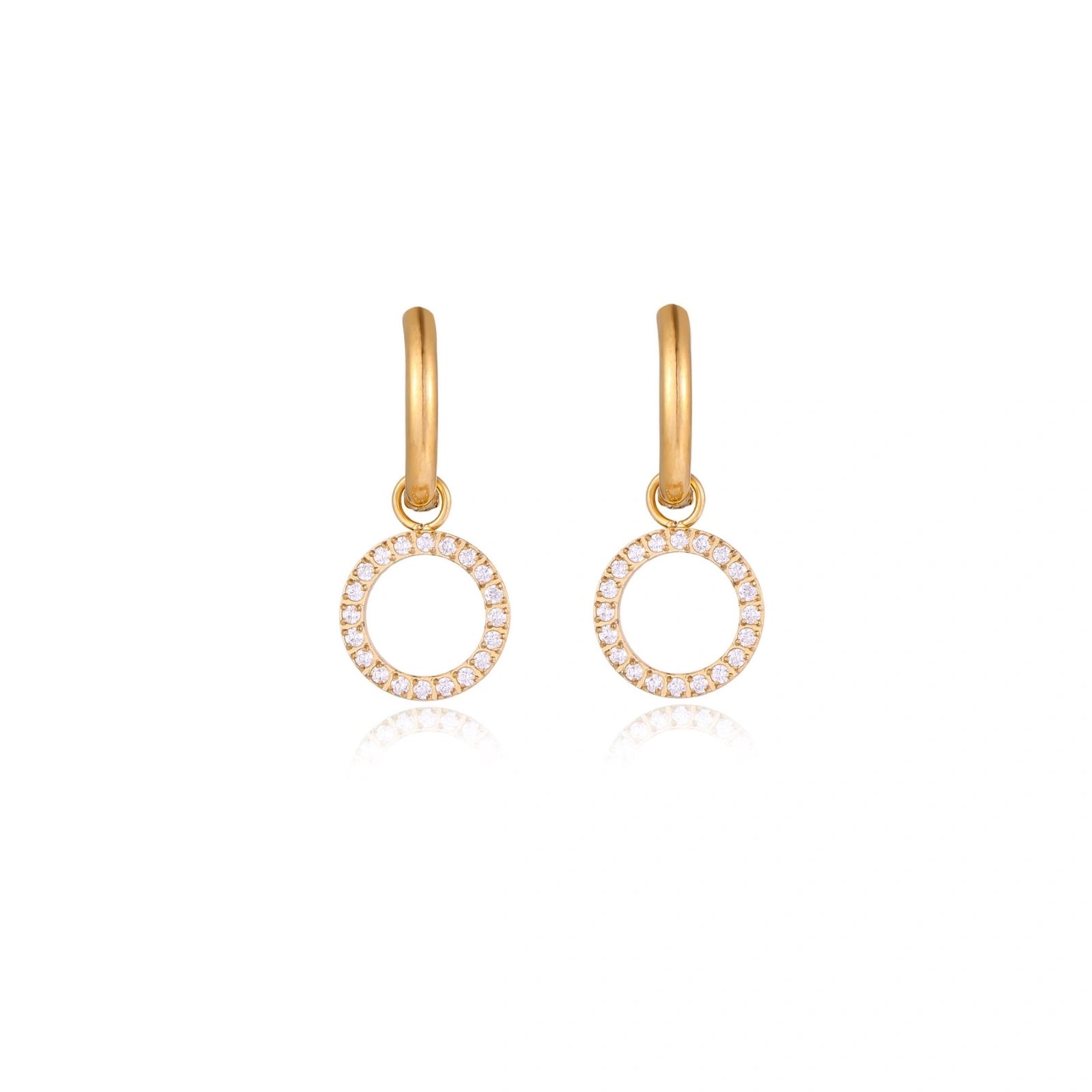 Gold-plated huggie hoop earrings with CZ-studded open circle charms on beige background