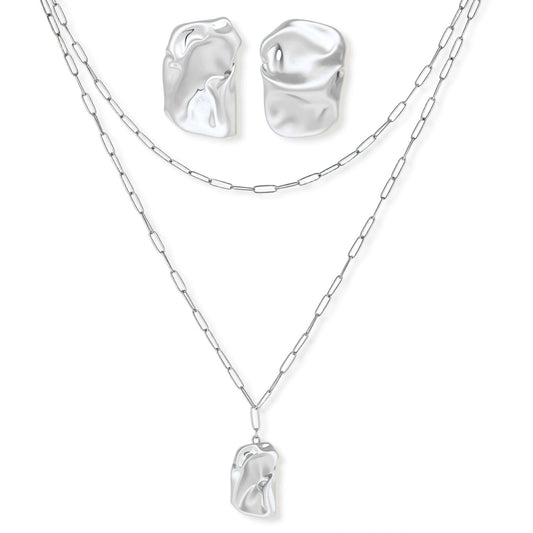 Modern textured hoop earrings and layered chain necklace with liquid metal pendant in silver and gold finishes.