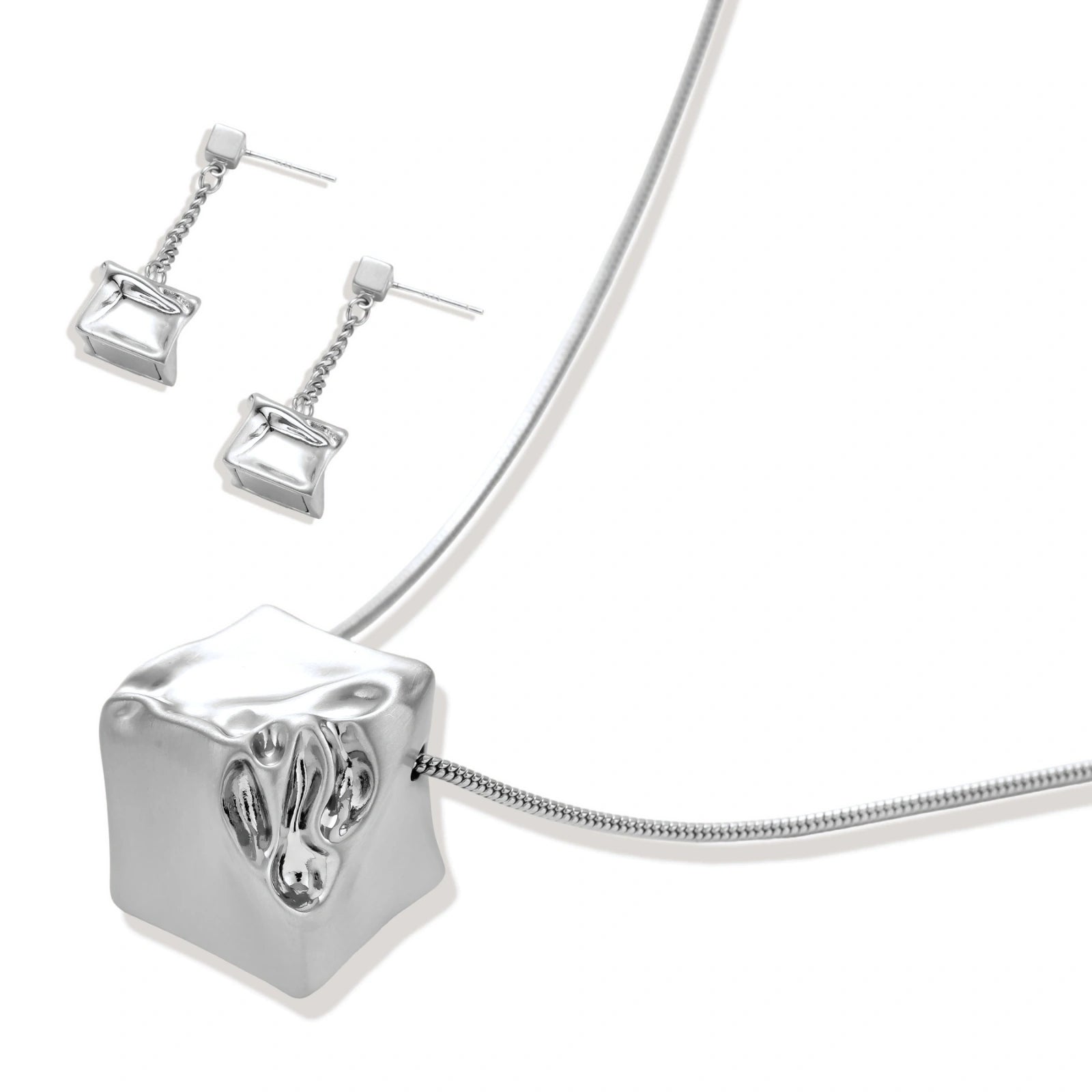 Geometric jewelry set with textured cube pendants on chains, featuring eco-zinc alloy in silver and gold finishes.