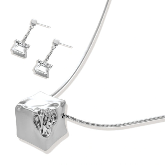 Geometric jewelry set with textured cube pendants on chains, featuring eco-zinc alloy in silver and gold finishes.