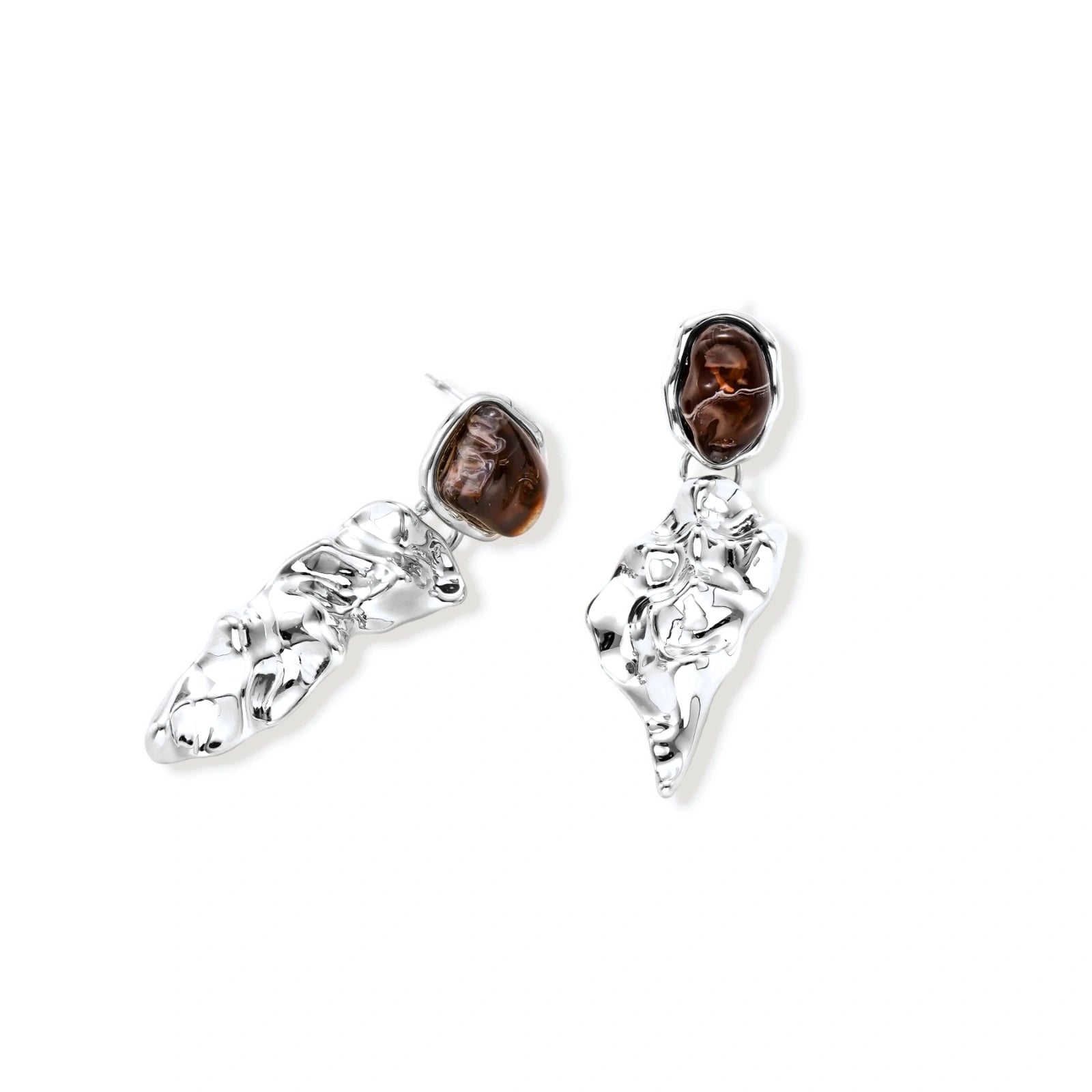 Abstract sculptural silver earrings with brown resin stones featuring organic fluid metalwork design on white background.