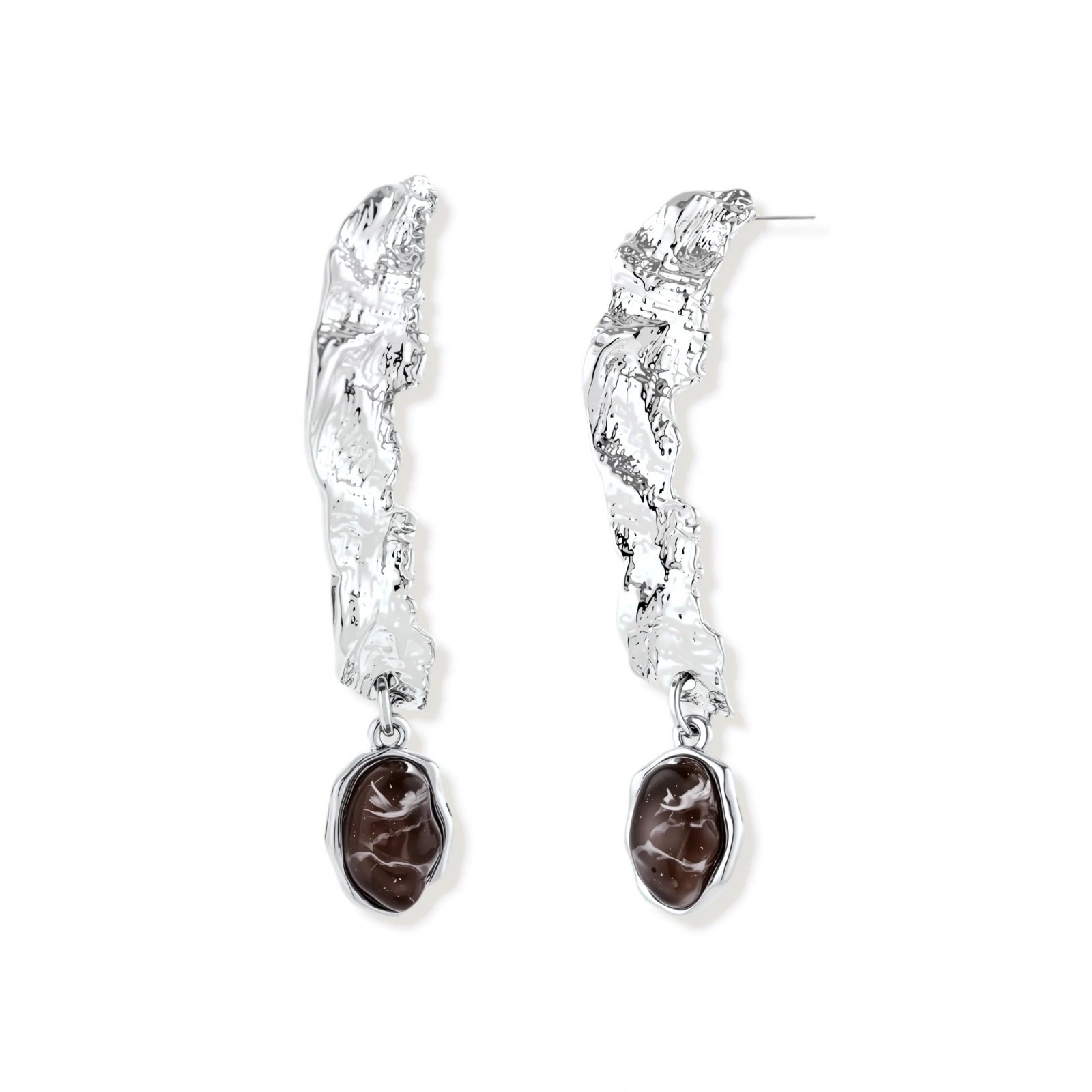 Silver-toned twisted metal earrings with dark brown oval resin stones dangling from sculptural posts on white background.
