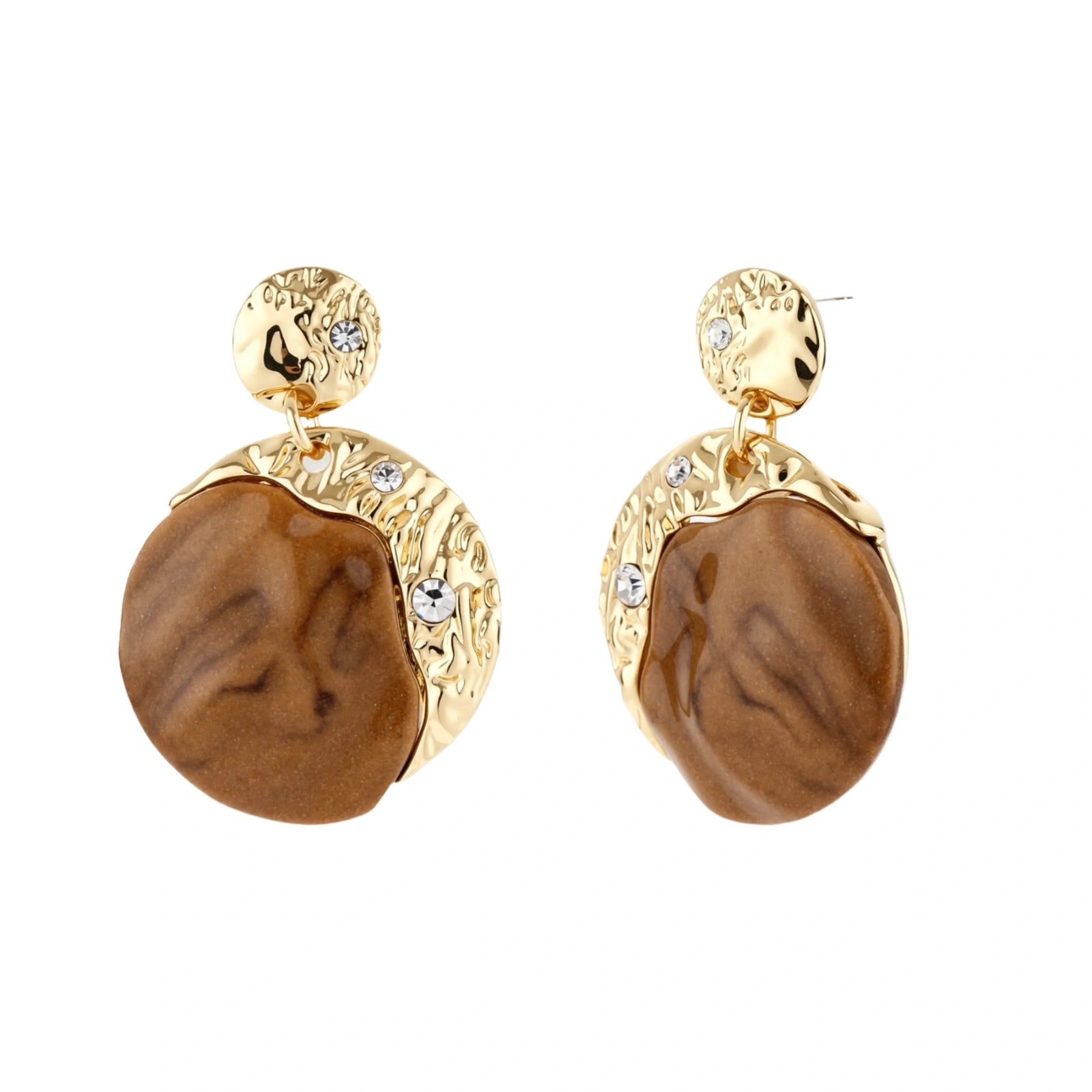 Gold-toned dangle earrings with organic brown resin stones and crystal accents on white background