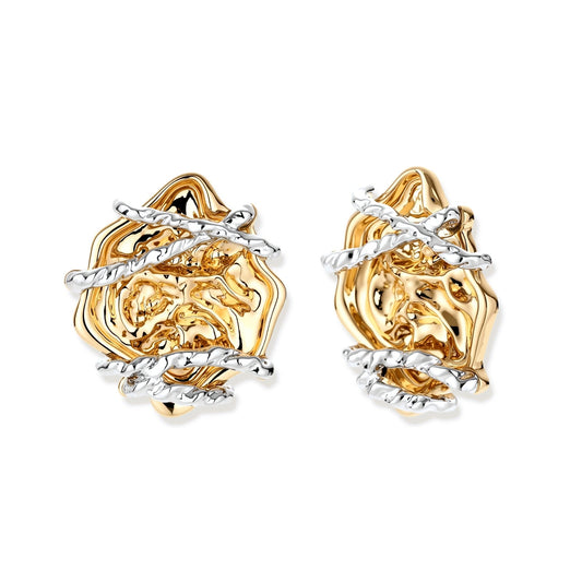 Sculptural rose-shaped stud earrings in gold with silver wire details and S925 posts on cream background.
