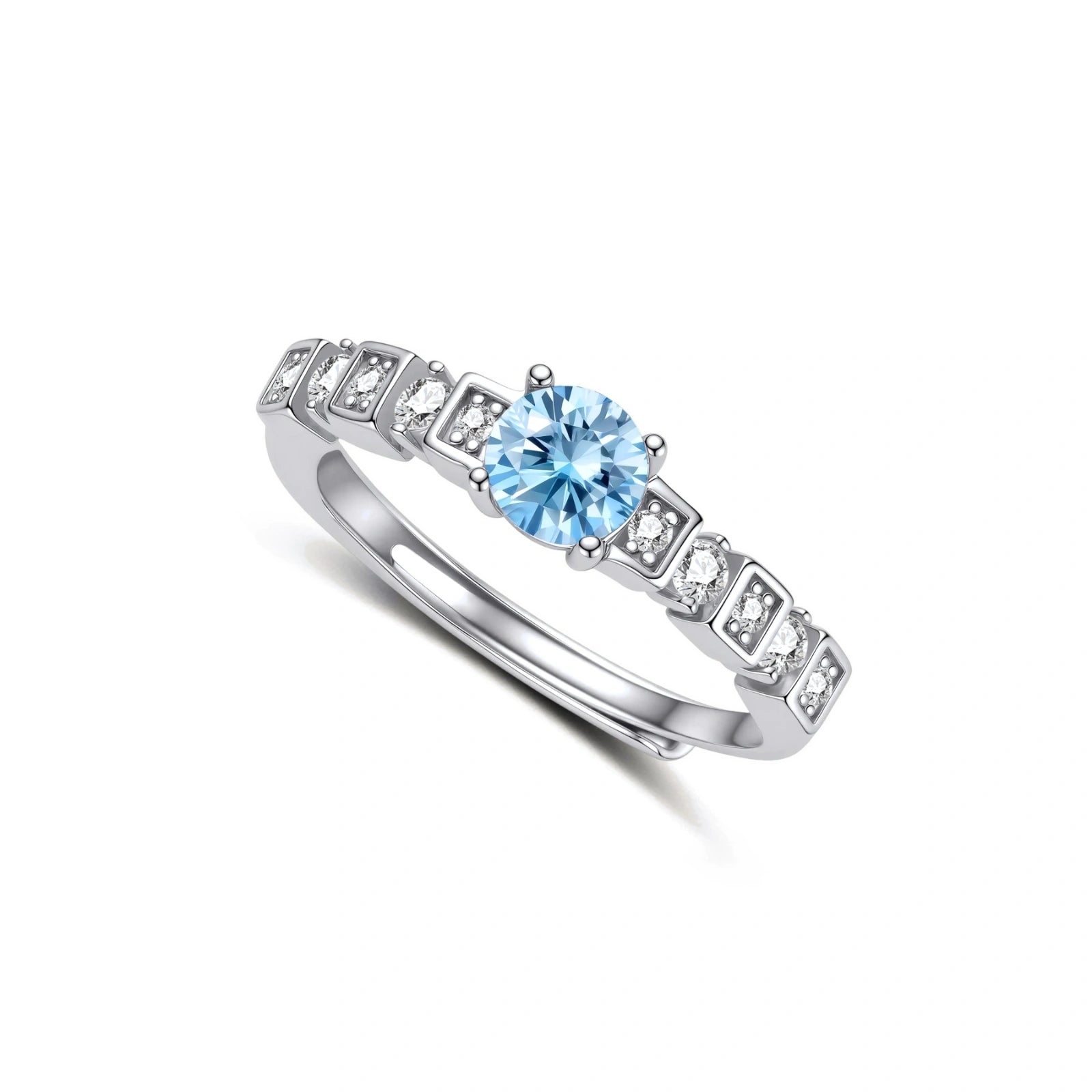 Geometric sterling silver ring with light blue moissanite center stone and square diamond accents on white background
