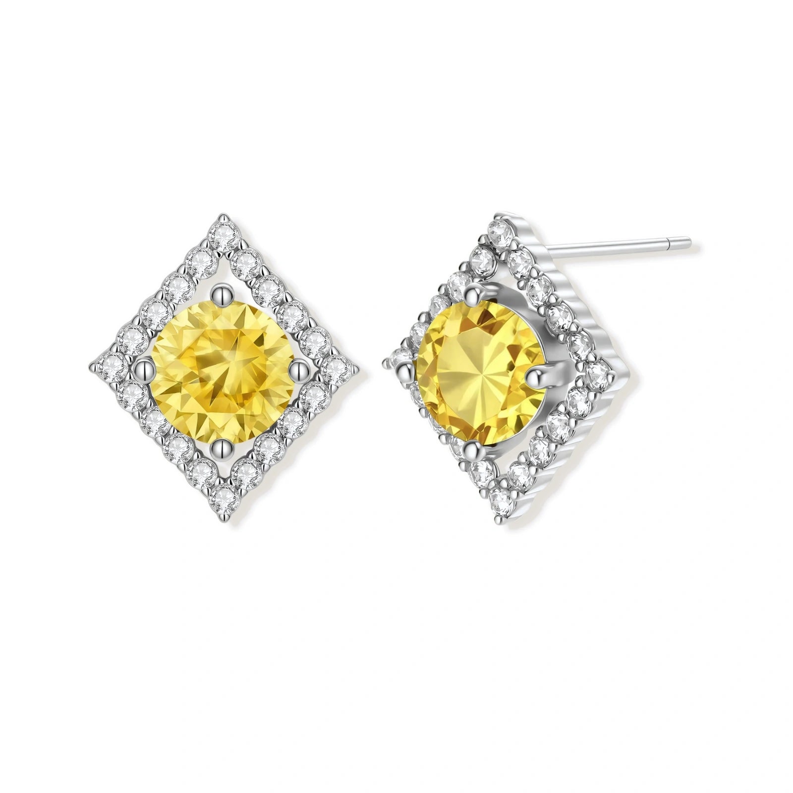 Close-up of diamond-shaped stud earrings with yellow moissanite centers and clear stone halos in sterling silver setting