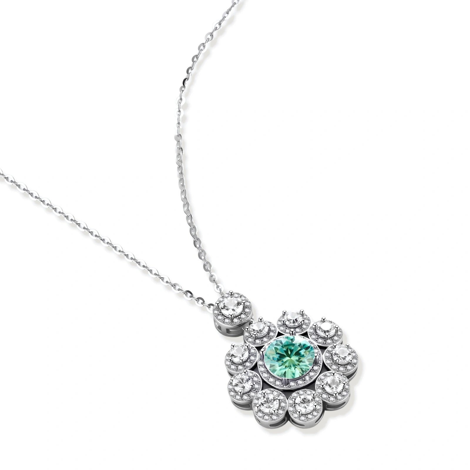 Delicate sterling silver necklace with flower-shaped pendant featuring bright green center moissanite and clear accent stones