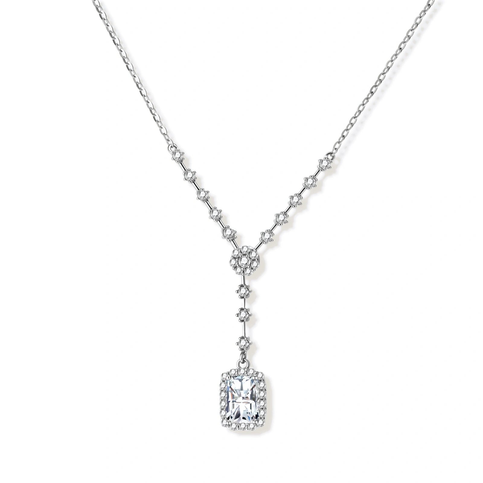 Sterling silver Y-necklace with rectangular moissanite pendant in halo setting and cascading accent stones on white background.