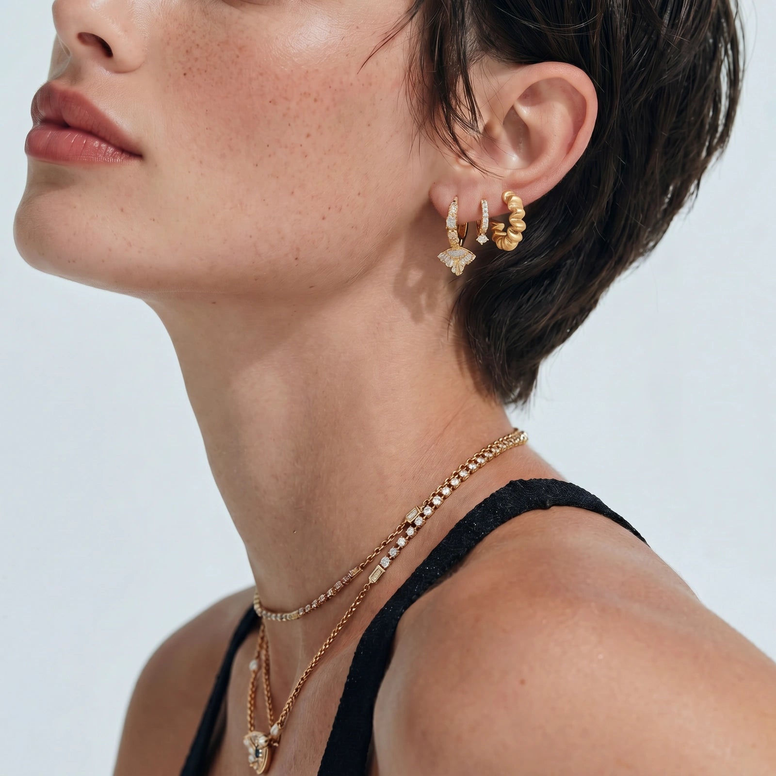 Twisted Gold Hoops by AlbaLuxe