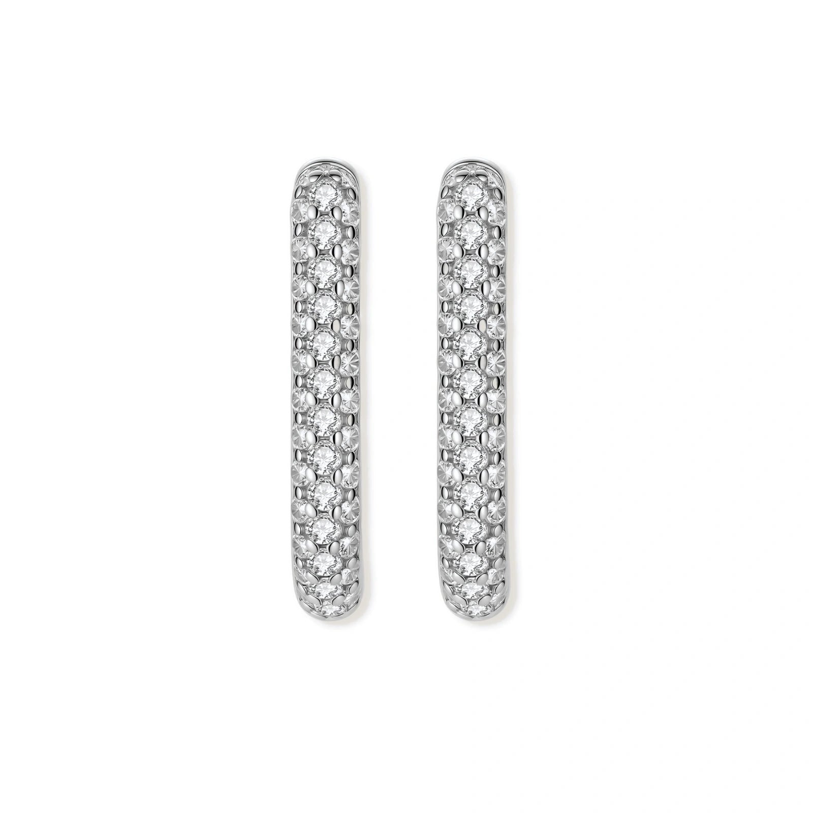 Close-up of platinum-plated sterling silver huggie hoops with pavé crystal setting on white background.
