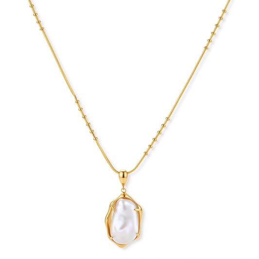 18K gold-plated sterling silver necklace with alternating bead chain and baroque pearl pendant on neutral background.
