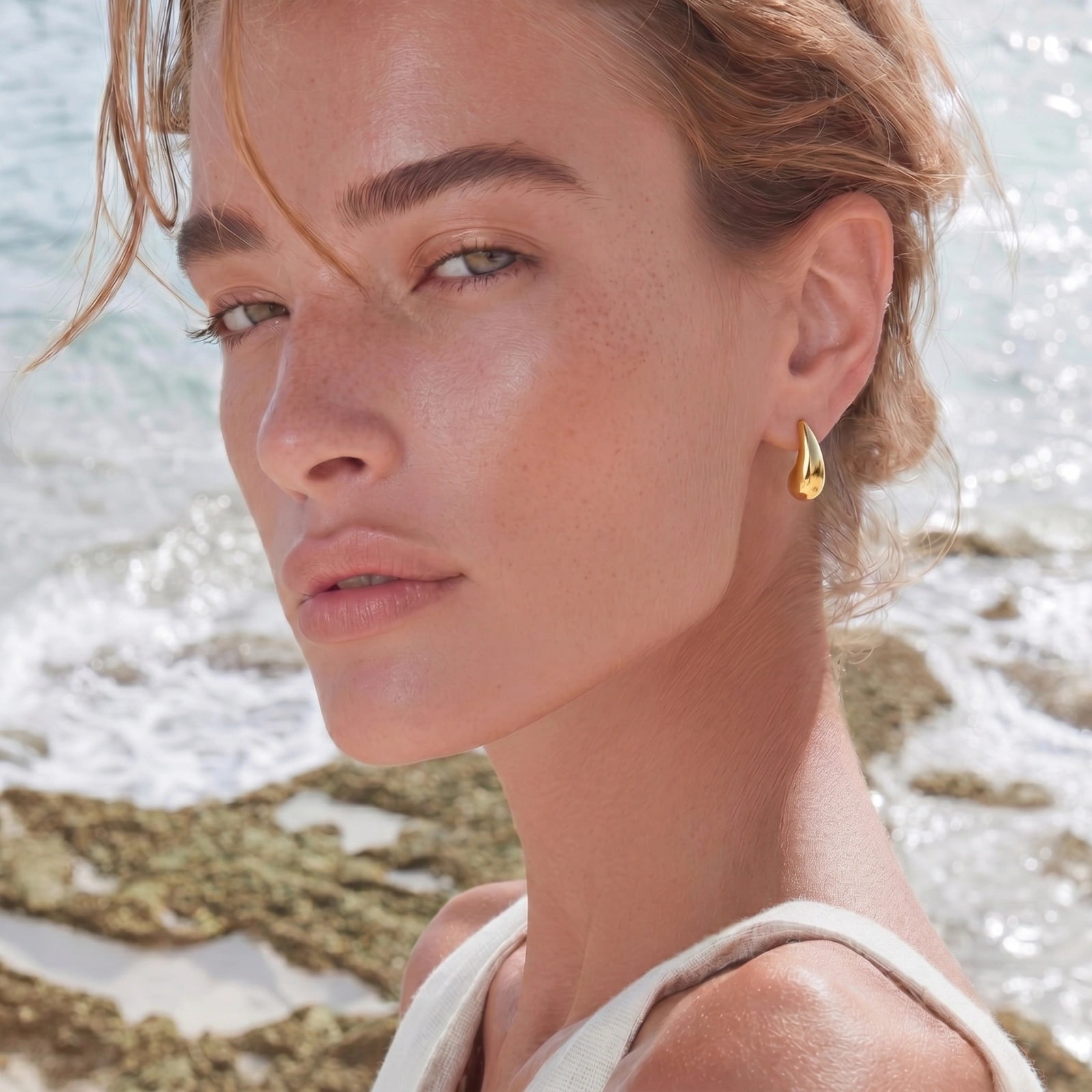 Golden Teardrop Studs by AlbaLuxe AlbaLuxe
