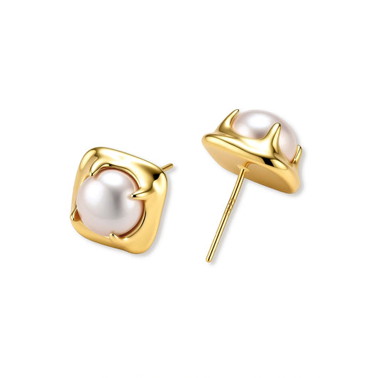 Pair of square gold-plated sterling silver stud earrings with sculpted molten edges and a round white freshwater pearl.