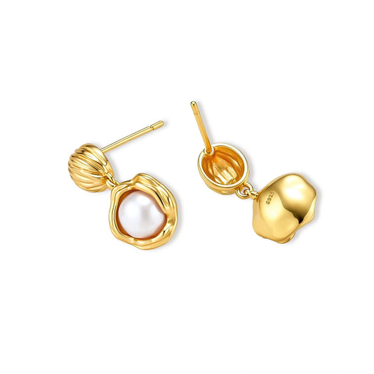 Gold-plated sterling silver drop earrings with a ribbed oval stud top and a freshwater pearl in a molten-textured gold frame.