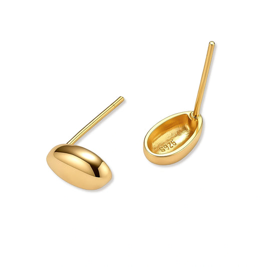 Pair of glossy gold-plated sterling silver oval droplet stud earrings with post backs on a cream background.