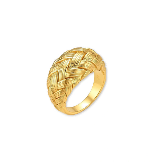 Gold woven braid dome ring in 18K gold-plated 925 sterling silver with fine ridged strands on a cream background.