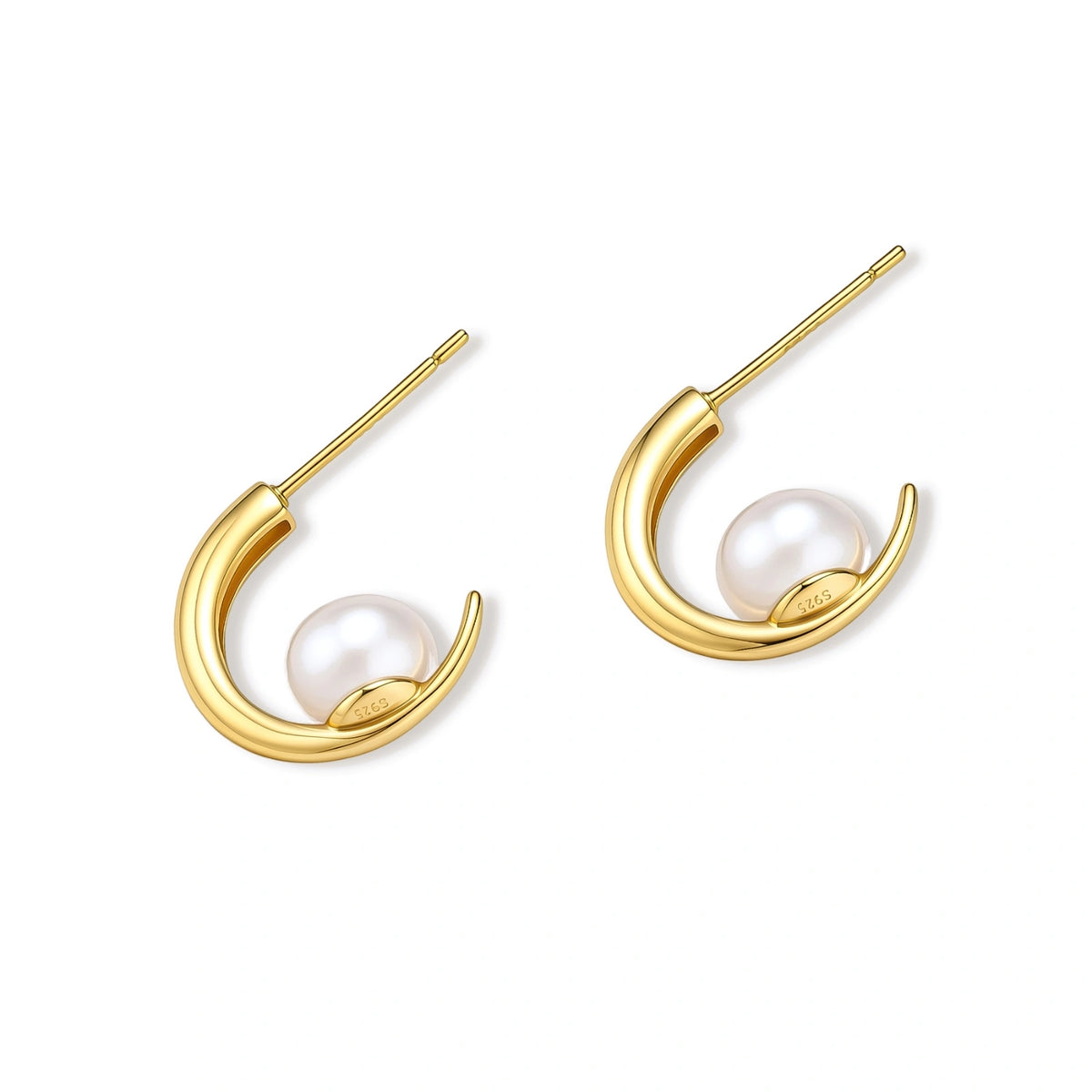 Pair of gold-plated sterling silver half-hoop earrings, each cradling a round white simulated pearl, on a cream background.