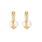 Pair of gold-plated sterling silver half-hoop earrings, each cradling a round white simulated pearl, on a cream background.