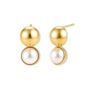 Pair of 18K gold-plated sterling silver stud earrings with a glossy gold dome stacked above a round simulated pearl on cream.