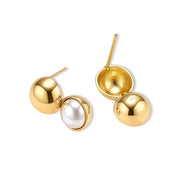 Pair of 18K gold-plated sterling silver stud earrings with a glossy gold dome stacked above a round simulated pearl on cream.