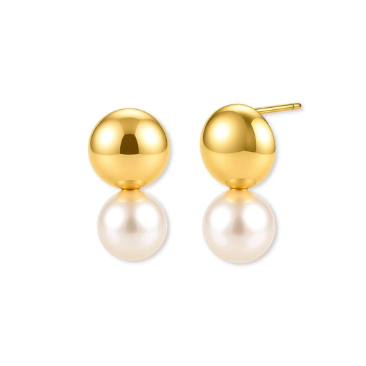 Pair of 18K gold-plated sterling silver stud earrings with a glossy gold dome stacked above a round simulated pearl on cream.