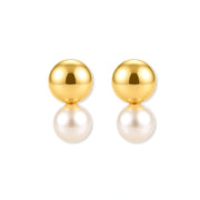 Pair of 18K gold-plated sterling silver stud earrings with a glossy gold dome stacked above a round simulated pearl on cream.